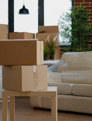 Image of a living space packed with boxes