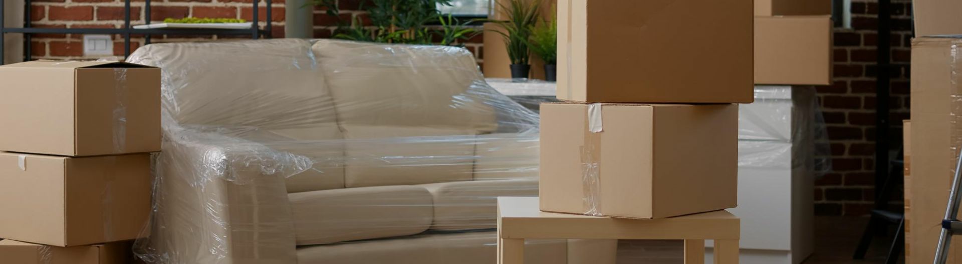 Image of a living space packed with boxes